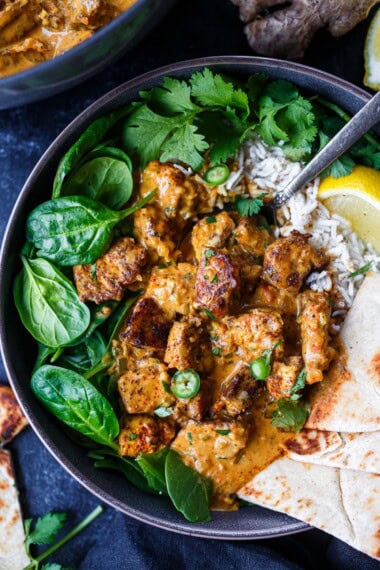 This Butter Tofu (Vegan Butter Chicken) is comforting, cozy, and aromatically spiced with a luscious tomato-coconut sauce. Plant-based and gluten-free.