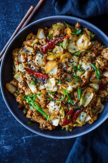 This Chicken Cabbage Stir-Fry is simple, bold, and seriously satisfying! Delicious on its own or spooned over rice or rice noodles, it's a quick, easy weeknight dinner.