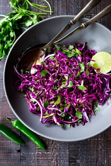 Mexican Slaw with jalape&ntilde;o and lime- perfect for fish tacos or a vegan side to your Mexican Feast. Fast and easy and Vegan! #tacoslaw #mexicanslaw #cabbageslaw #slaw #veganslaw
