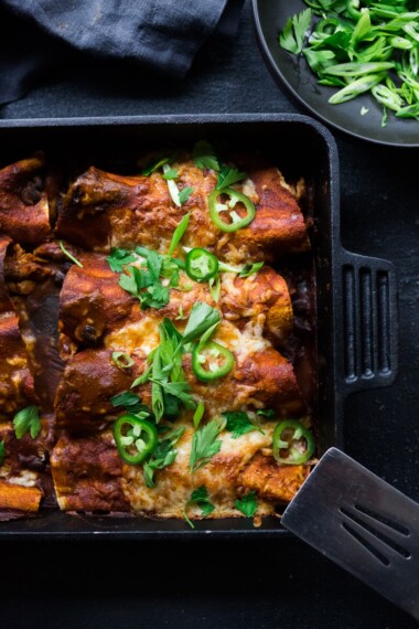 These Turkey Enchiladas with black beans are so hearty and flavorful! Make them with leftover Thanksgiving turkey and our&nbsp; 5-minute Homemade Enchilada Sauce. A tasty easy meal that can be eaten now, or frozen for later!&nbsp;
